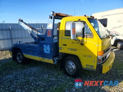 Czwarte zdjęcie samochodu z boku: 1990 ISUZU NPR TOW TRUCK VIN:JALB4B1H3L7000999 - miniatura