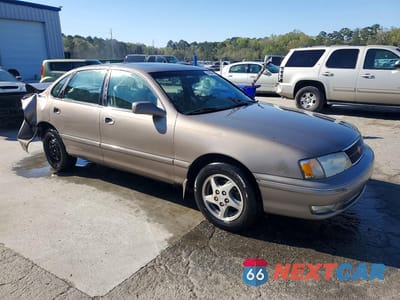 Czwarte zdjęcie samochodu z boku: 1999 TOYOTA AVALON XLS VIN:4T1BF18B5XU301087 - miniatura