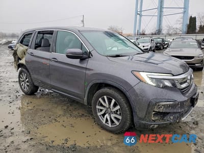 Czwarte zdjęcie samochodu z boku: 2019 HONDA PILOT EXL VIN:5FNYF6H53KB028674 - miniatura