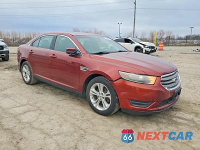 Czwarte zdjęcie samochodu z boku: 2014 FORD TAURUS SEL VIN:1FAHP2E80EG124587 - miniatura