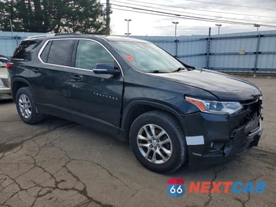 Czwarte zdjęcie samochodu z boku: 2018 CHEVROLET TRAVERSE LT VIN:1GNERGKW5JJ107831 - miniatura
