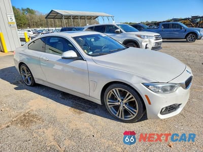 Czwarte zdjęcie samochodu z boku: 2017 BMW 430I VIN:WBA4R7C39HK896009 - miniatura