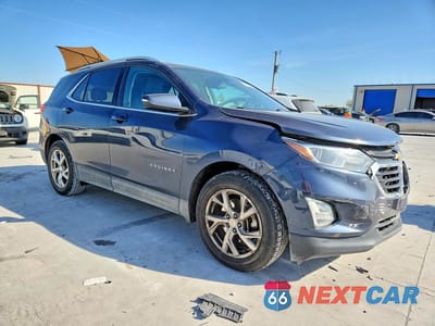 Czwarte zdjęcie samochodu z boku: 2018 CHEVROLET EQUINOX LT VIN:3GNAXKEX1JL278015 - miniatura