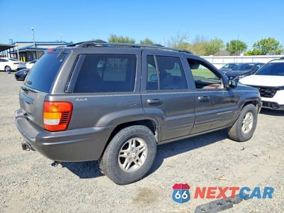 Trzecie zdjęcie samochodu z tyłu: 2000 JEEP GRAND CHEROKEE LIMITED VIN:1J4GW58S4YC378763 - miniatura