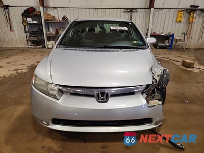 Piąte zdjęcie samochodu w środku: 2006 HONDA CIVIC VIN:1HGFA16526L149664 - miniatura