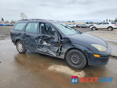 Czwarte zdjęcie samochodu z boku: 2004 FORD FOCUS SE VIN:1FAFP36354W153894 - miniatura