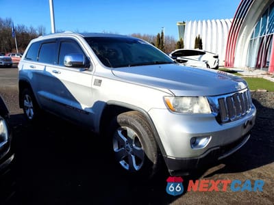 Czwarte zdjęcie samochodu z boku: 2012 JEEP GRAND CHEROKEE LIMITED VIN:1C4RJFBT6CC103232 - miniatura