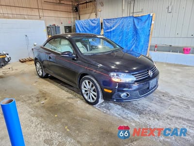 Czwarte zdjęcie samochodu z boku: 2015 VOLKSWAGEN EOS KOMFORT VIN:WVWBW8AH0FV005530 - miniatura