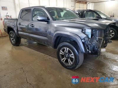 Czwarte zdjęcie samochodu z boku: 2019 TOYOTA TACOMA TRD SPORT VIN:3TMCZ5AN9KM218724 - miniatura