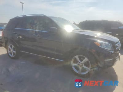 Czwarte zdjęcie samochodu z boku: 2016 MERCEDES-BENZ GLE 350 VIN:4JGDA5JB8GA663960 - miniatura