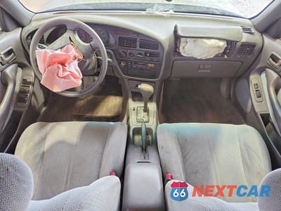 Zdjęcie 8 z 12 samochodu: 1994 TOYOTA CAMRY LE VIN:JT2SK12E3R0217890 - miniatura