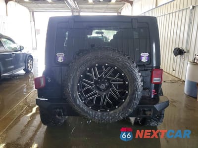 Zdjęcie 6 z 13 samochodu: 2015 JEEP WRANGLER UNLIMITED SAHARA VIN:1C4BJWEG8FL509209 - miniatura