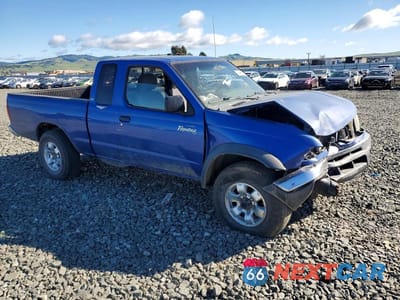 Czwarte zdjęcie samochodu z boku: 1999 NISSAN FRONTIER XE-V6 VIN:1N6ED26Y1XC310537 - miniatura