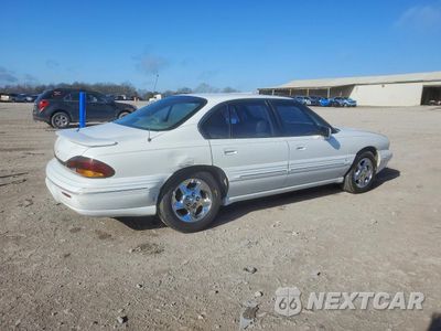 Trzecie zdjęcie samochodu z tyłu: 1999 PONTIAC BONNEVILLE SE VIN:1G2HX52K2XH233680 - miniatura