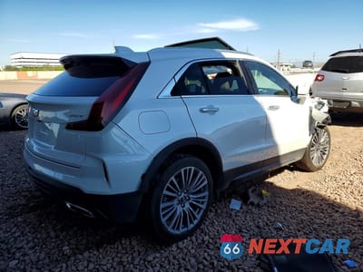Trzecie zdjęcie samochodu z tyłu: 2024 CADILLAC XT4 PREMIUM LUXURY VIN:1GYFZDR42RF123204 - miniatura
