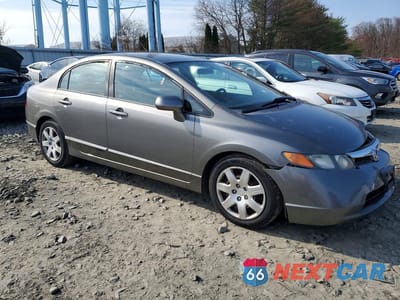 Czwarte zdjęcie samochodu z boku: 2007 HONDA CIVIC LX VIN:2HGFA16557H315092 - miniatura