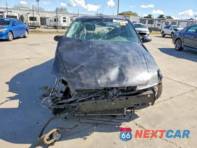 Piąte zdjęcie samochodu w środku: 2005 FORD FOCUS ZX4 VIN:1FAFP34NX5W281120 - miniatura