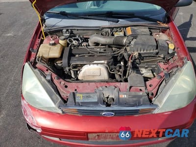 Zdjęcie 11 z 12 samochodu: 2004 FORD FOCUS ZX3 VIN:3FAFP31324R121043 - miniatura