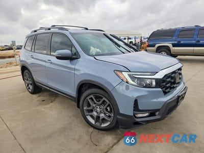 Czwarte zdjęcie samochodu z boku: 2022 HONDA PASSPORT EXL VIN:5FNYF7H56NB002550 - miniatura