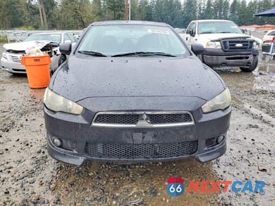 Piąte zdjęcie samochodu w środku: 2009 MITSUBISHI LANCER ES VIN:JA3AU26U59U015905 - miniatura