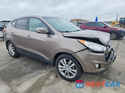 Czwarte zdjęcie samochodu z boku: 2013 HYUNDAI TUCSON LIMITED VIN:KM8JU3AC9DU604787 - miniatura