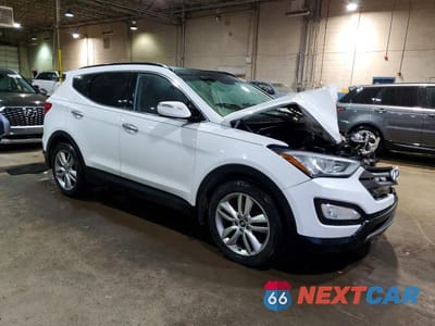 Czwarte zdjęcie samochodu z boku: 2014 HYUNDAI SANTA FE SPORT 2.0T VIN:5XYZW3LA3EG199753 - miniatura