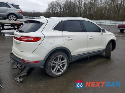 Trzecie zdjęcie samochodu z tyłu: 2015 LINCOLN MKC VIN:5LMCJ2A91FUJ35730 - miniatura