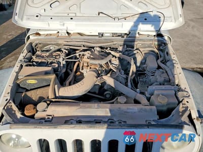 Zdjęcie 12 z 13 samochodu: 2010 JEEP WRANGLER VIN:1J4AA2D13AL173487 - miniatura