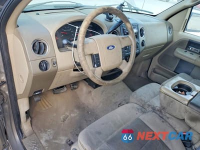 Zdjęcie 8 z 12 samochodu: 2004 FORD F150 VIN:1FTRF12W34NA74177 - miniatura