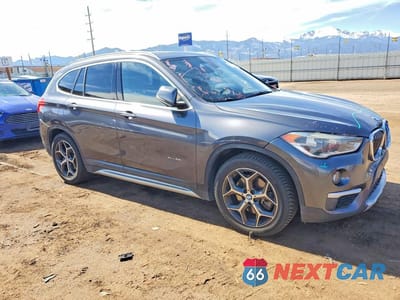 Czwarte zdjęcie samochodu z boku: 2016 BMW X1 XDRIVE28I VIN:WBXHT3Z3XG4A49112 - miniatura