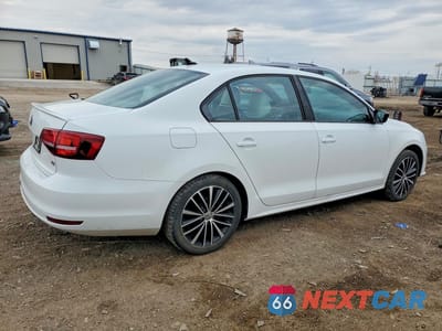 Trzecie zdjęcie samochodu z tyłu: 2016 VOLKSWAGEN JETTA SPORT VIN:3VWD17AJ3GM242896 - miniatura