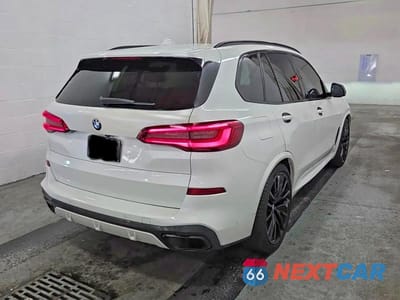 Czwarte zdjęcie samochodu z boku: 2020 BMW X5 SDRIVE 40I VIN:5UXCR4C08L9B00161 - miniatura