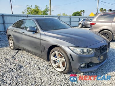 Czwarte zdjęcie samochodu z boku: 2015 BMW 428 XI GRAN COUPE VIN:WBA4A7C52FD415561 - miniatura