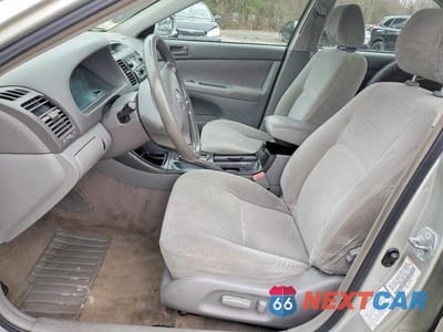 Zdjęcie 7 z 13 samochodu: 2002 TOYOTA CAMRY LE VIN:JTDBE32K420119764 - miniatura