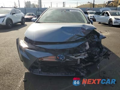 Piąte zdjęcie samochodu w środku: 2022 TOYOTA COROLLA HYBRID LE VIN:JTDEAMDE4NJ052796 - miniatura