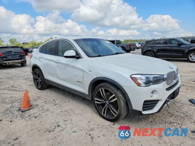 Czwarte zdjęcie samochodu z boku: 2015 BMW X4 XDRIVE28I VIN:5UXXW3C53F0M88731 - miniatura