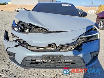 Piąte zdjęcie samochodu w środku: 2023 HONDA CIVIC TOURING VIN:2HGFE1F94PH322347 - miniatura