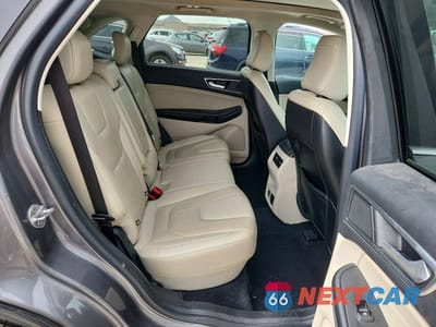 Zdjęcie 10 z 11 samochodu: 2021 FORD EDGE TITANIUM VIN:2FMPK4K94MBA26919 - miniatura