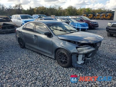Czwarte zdjęcie samochodu z boku: 2016 VOLKSWAGEN JETTA S VIN:3VW267AJ1GM381398 - miniatura