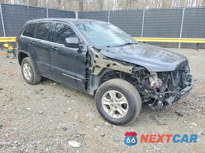 Czwarte zdjęcie samochodu z boku: 2014 JEEP GRAND CHEROKEE LAREDO VIN:1C4RJFAG4EC249474 - miniatura