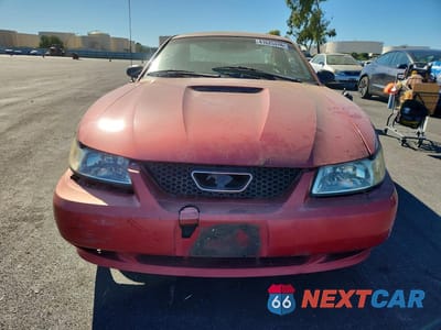 Piąte zdjęcie samochodu w środku: 1999 FORD MUSTANG VIN:1FAFP4047XF136378 - miniatura