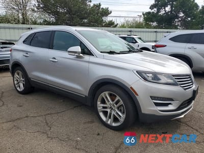 Czwarte zdjęcie samochodu z boku: 2017 LINCOLN MKC RESERVE VIN:5LMCJ3D98HUL32561 - miniatura