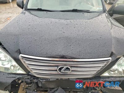 Zdjęcie 12 z 13 samochodu: 2009 LEXUS GX 470 BASE VIN:JTJBT20X490179002 - miniatura