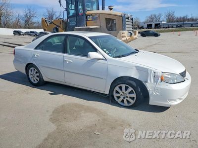 Czwarte zdjęcie samochodu z boku: 2002 TOYOTA CAMRY LE VIN:4T1BE32K32U052725 - miniatura