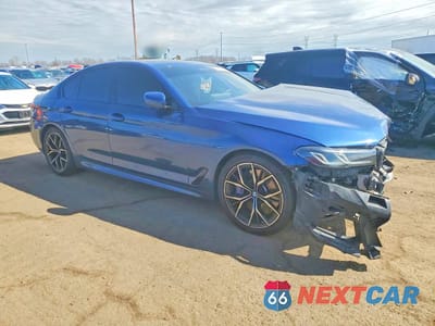 Czwarte zdjęcie samochodu z boku: 2022 BMW M550XI VIN:WBA13BK0XNCJ16197 - miniatura