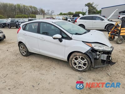 Czwarte zdjęcie samochodu z boku: 2016 FORD FIESTA SE VIN:3FADP4EJ1GM180625 - miniatura