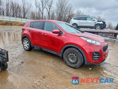 Czwarte zdjęcie samochodu z boku: 2019 KIA SPORTAGE LX VIN:KNDPM3AC8K7535715 - miniatura