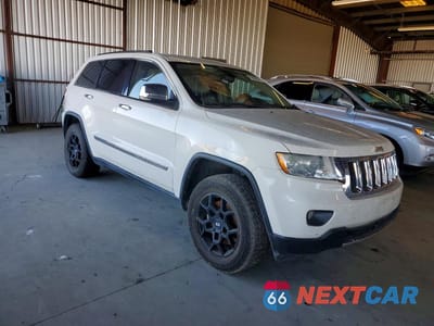 Czwarte zdjęcie samochodu z boku: 2012 JEEP GRAND CHEROKEE OVERLAND VIN:1C4RJFCT9CC269727 - miniatura