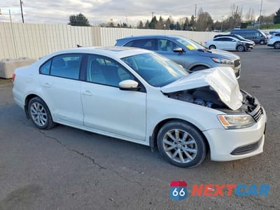 Czwarte zdjęcie samochodu z boku: 2012 VOLKSWAGEN JETTA SE VIN:3VWDP7AJ4CM375417 - miniatura