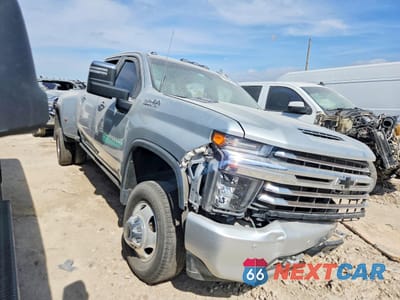 Czwarte zdjęcie samochodu z boku: 2022 CHEVROLET SILVERADO K3500 HIGH COUNTRY VIN:1GC4YVEY8NF270409 - miniatura